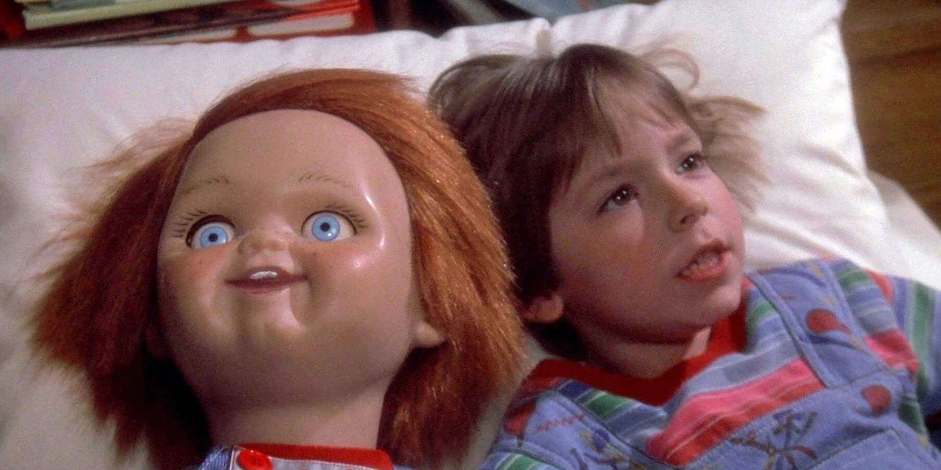 Chucky laying next to Andy in Child's Play