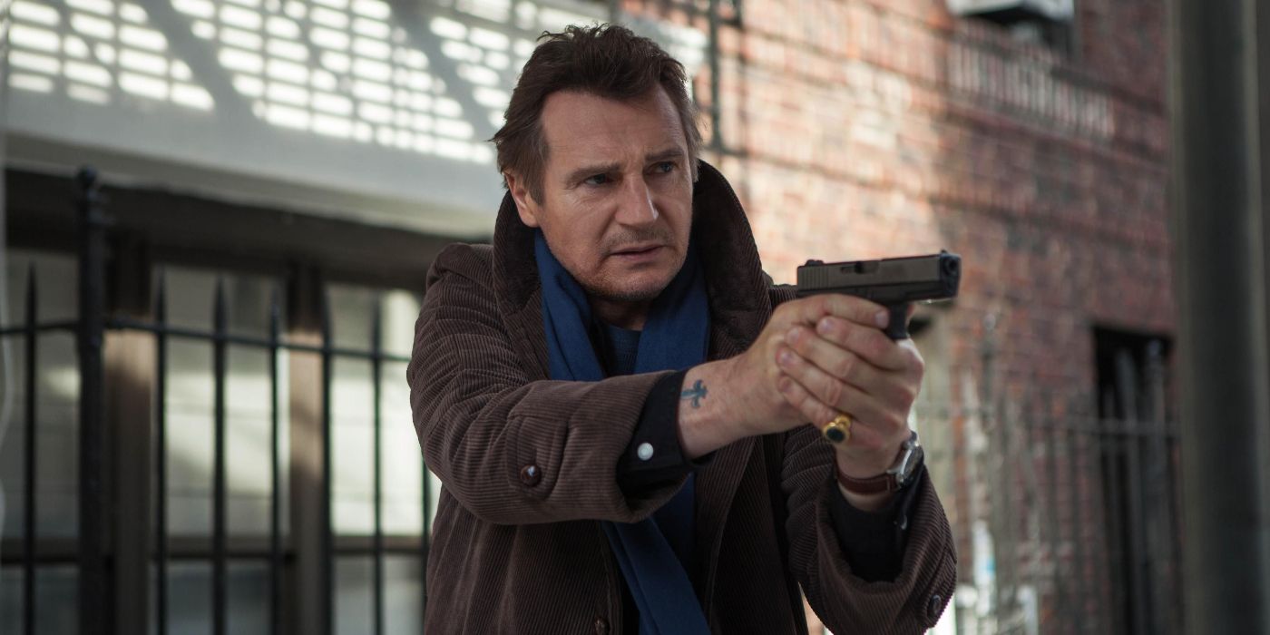 Liam Neeson with a gun in A Walk Among the Tombstones.