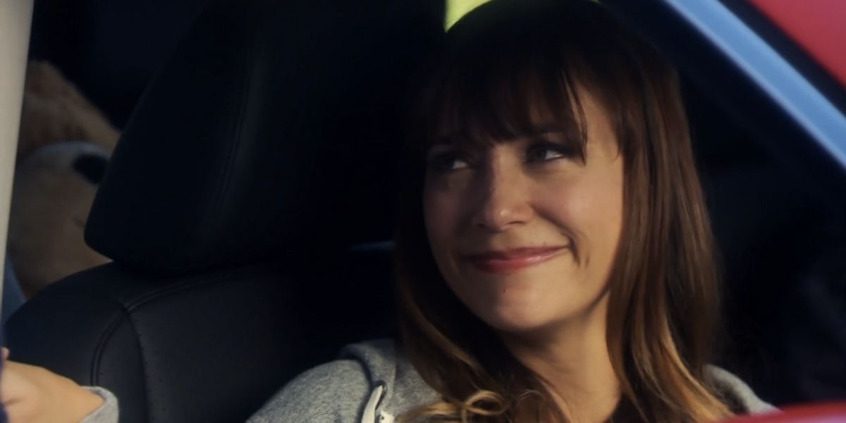 ann smiling inside the car