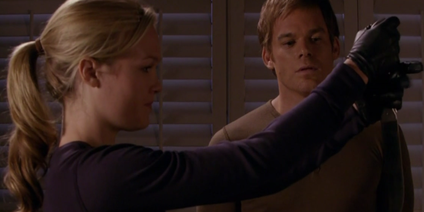 Lumen manipulates a knife as Dexter looks on
