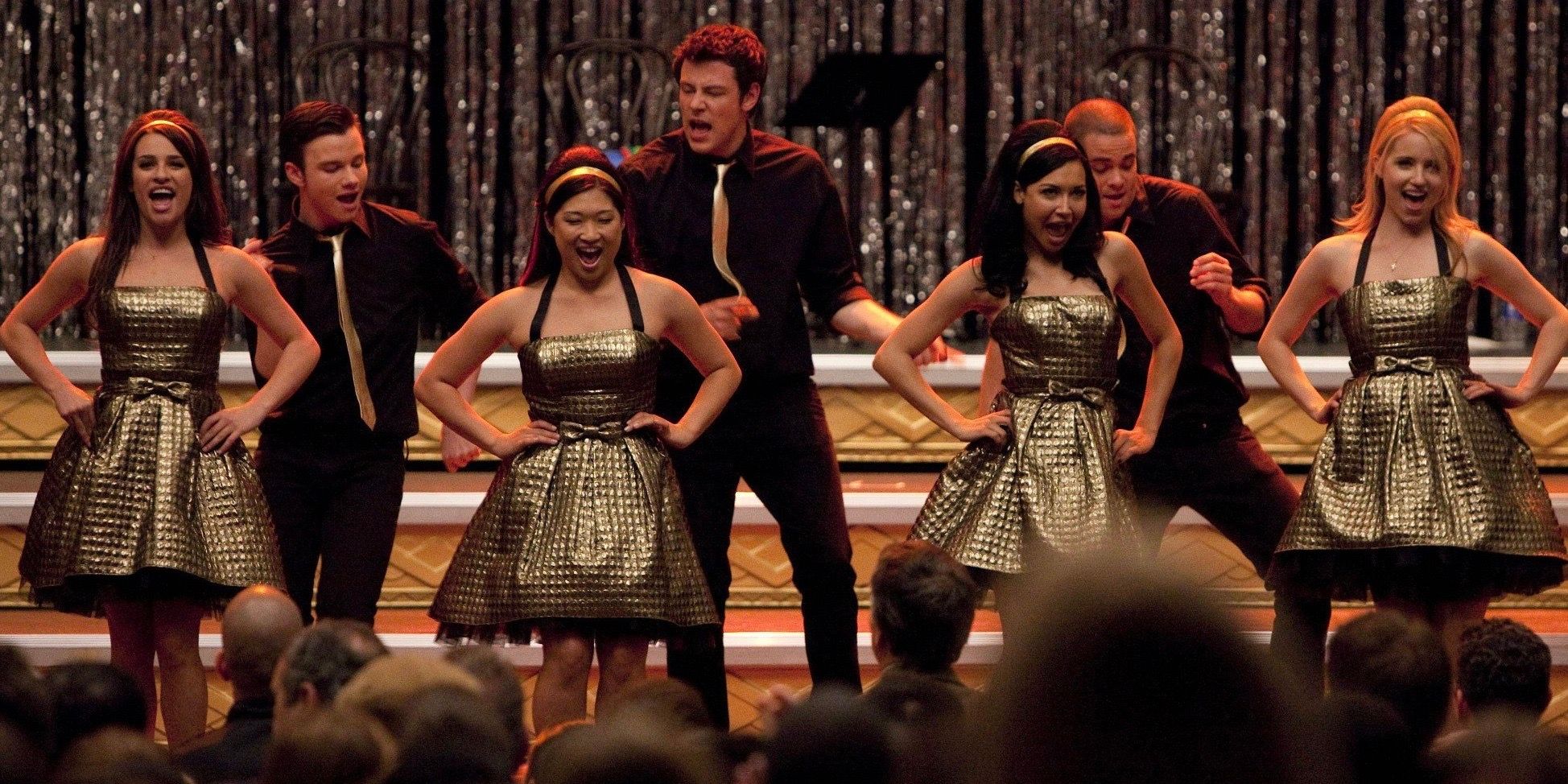 The New Directions performing on stage in Glee