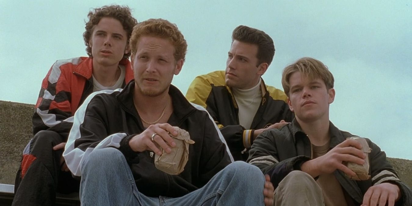 Will and his friends sit on the bleachers in Good Will Hunting.