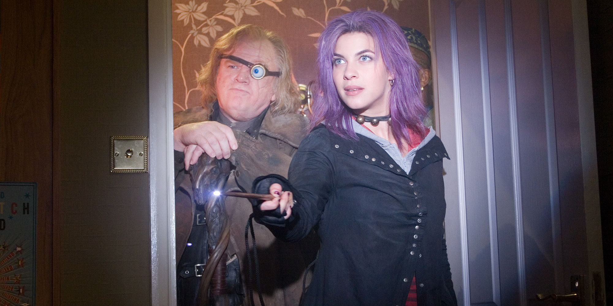 Nymphadora Tonks and Mad-Eye Moody standing in a doorway in Harry Potter. 