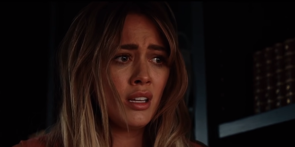Hilary Duff looking scared in The Haunting Of Sharon Tate