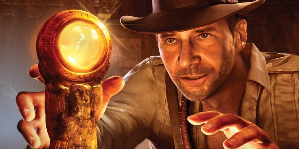 A close-up of Indiana Jones approaching a shiny object in the game Indiana Jones And The Staff Of Kings