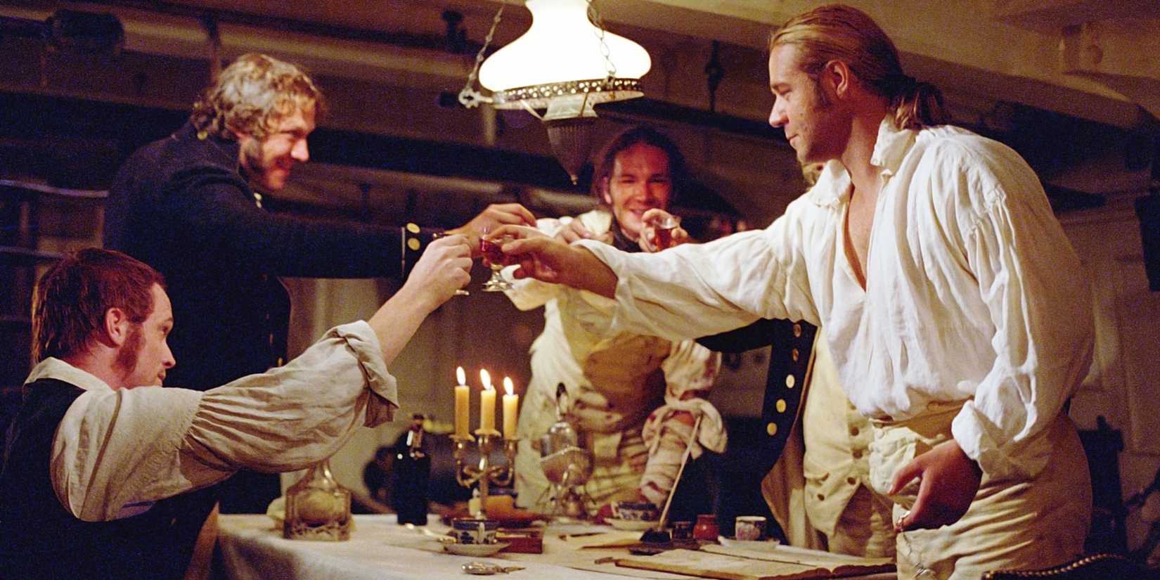 Characters giving a toast in Master and Commander
