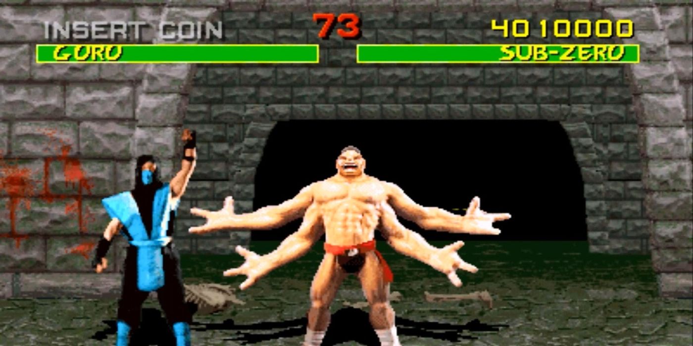 Sub-Zero et Goro posent avant un combat dans Mortal Kombat 