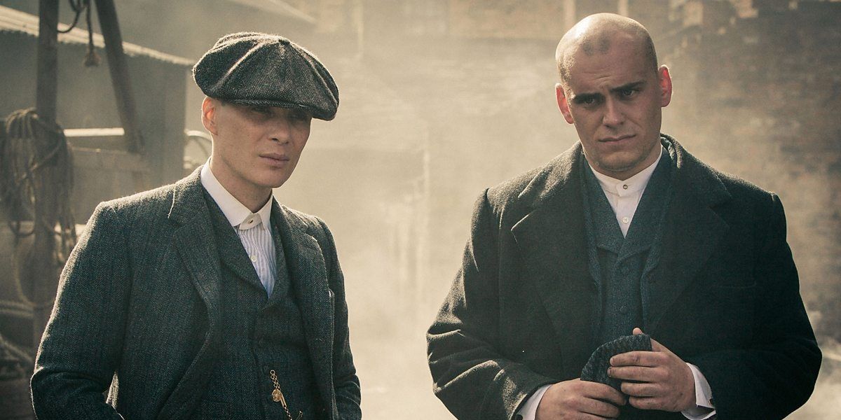 Tommy Shelby and Danny Whizz-Bang walking and talking in Season 1 Episode 1 of Peaky Blinders