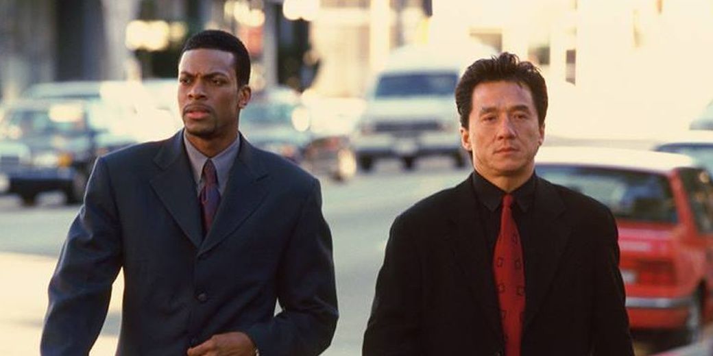 Jackie Chan and Chris Tucker walking down the street in Rush Hour