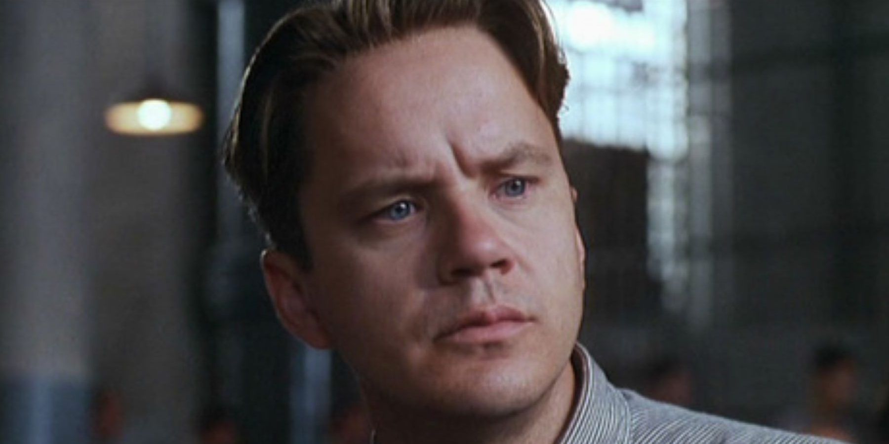 Tim Robbins looking questioning in The Shawshank Redemption.