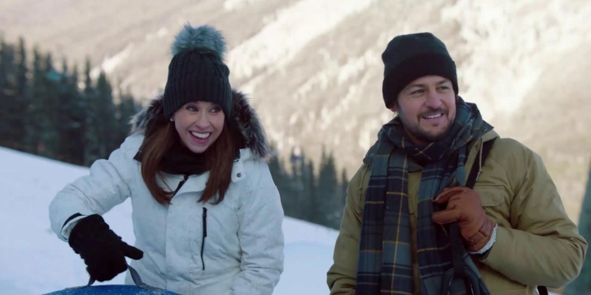 Chelsea and Owen outside on a date in Winter In Vail