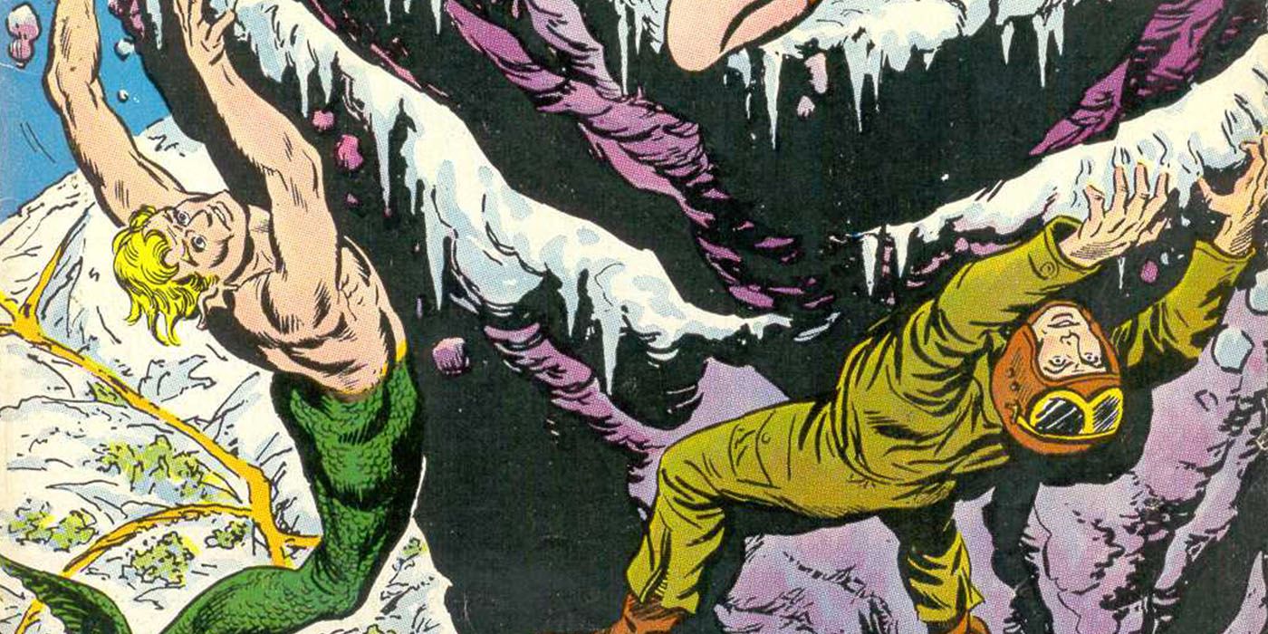 Steve Trevor and merman hanging from cliff