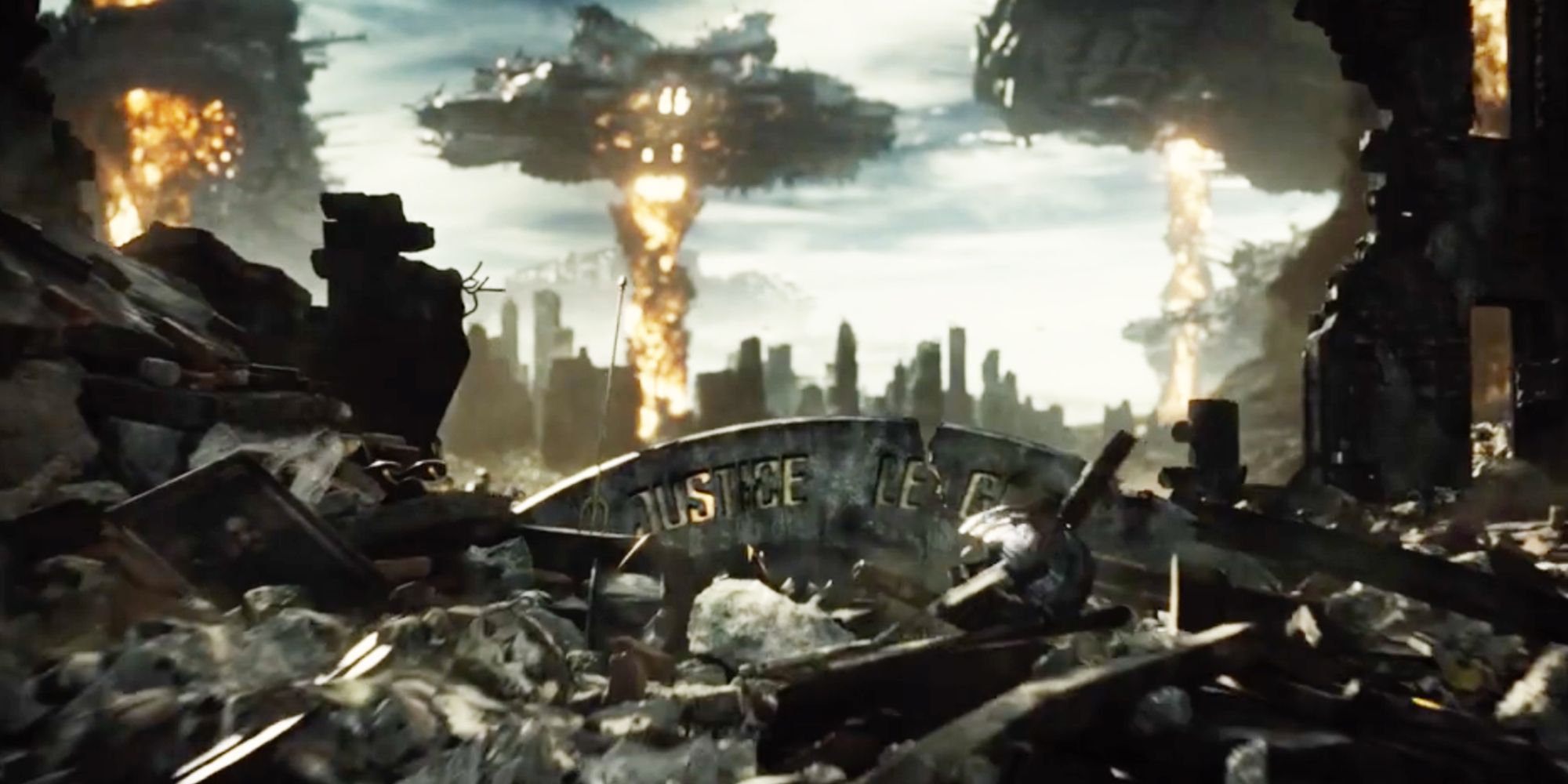 A Justice League sign is seen amid the rubble of Wayne Manor in the Knightmare Scene from Zack Snyder's Justice League