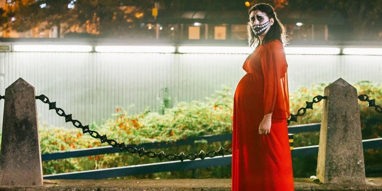 A pregnant woman with skull make-up in Prevenge.