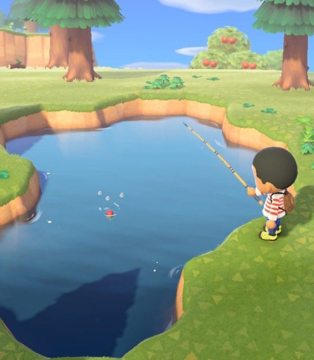 A player fishes in the holding pond on their island in Animal Crossing: New Horizons