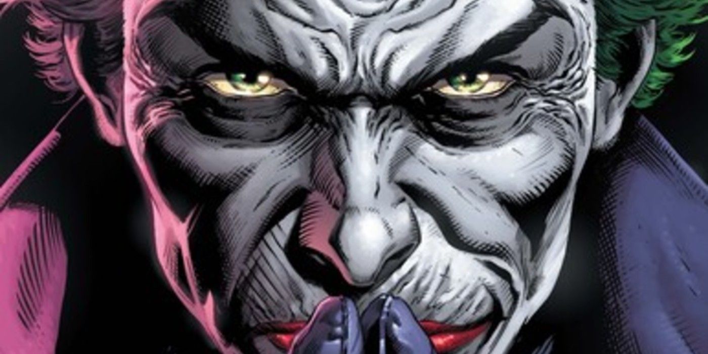 A stern-looking Joker contemplating in Three Jokers cover art.