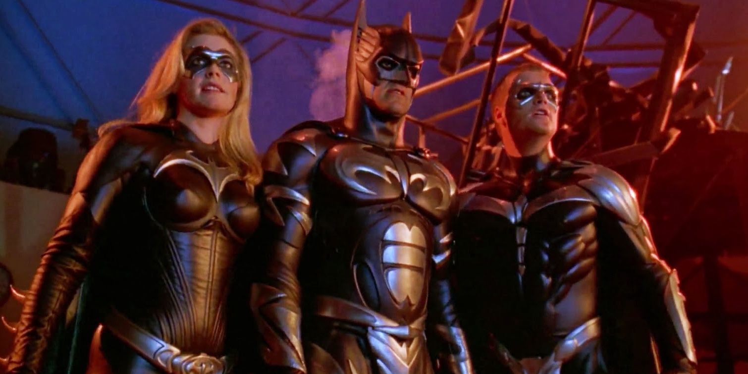 Batman, Robin and Batgirl standing together