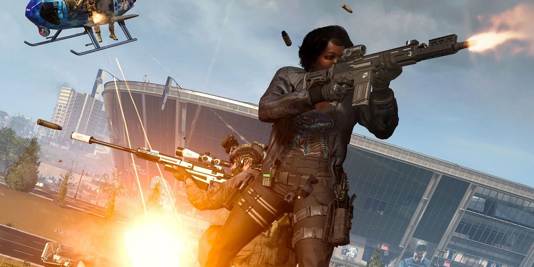 A screenshot from Call of DUty: Warzone showing players shooting guns back to back.
