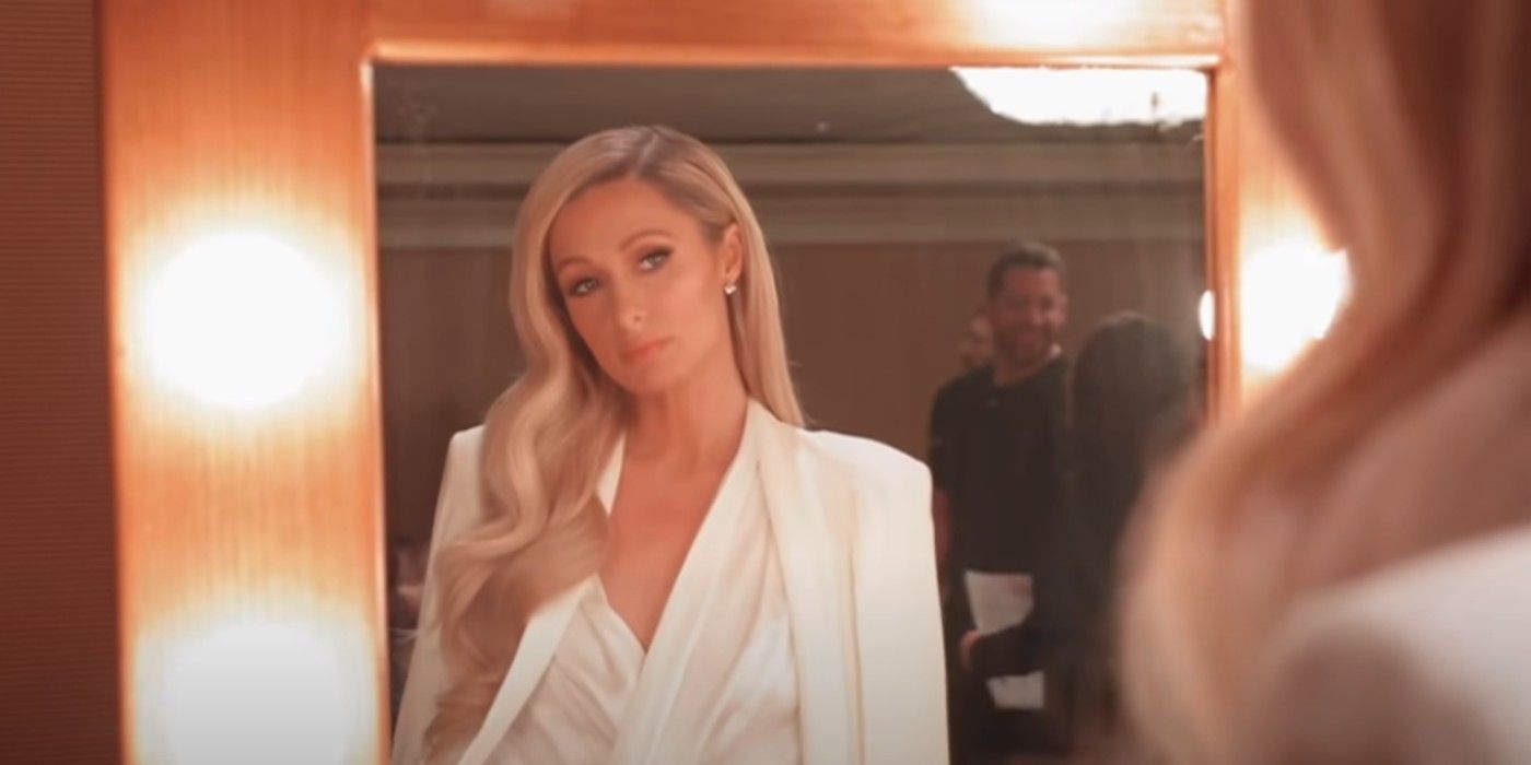 Paris Hilton looking in a mirror