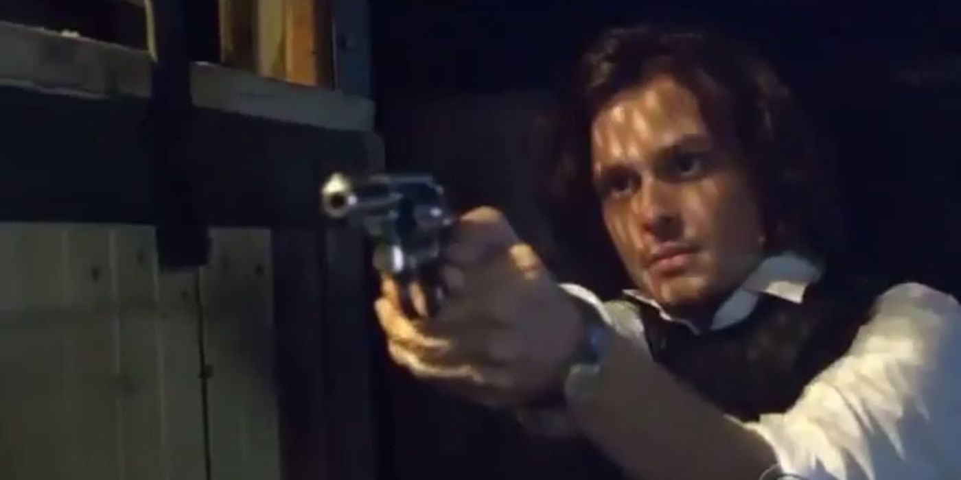 Reid pointing his gun in the Criminal Minds episode God Complex