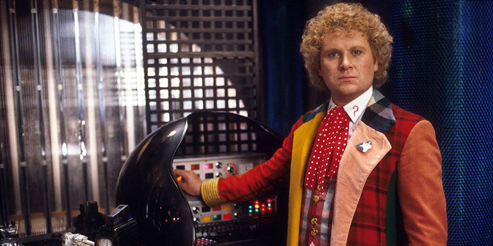 The Sixth Doctor stands in the Tardis from Doctor Who