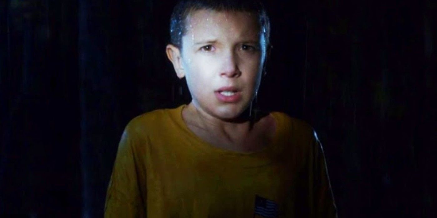 Eleven illuminated by a flashlight in Stranger Things