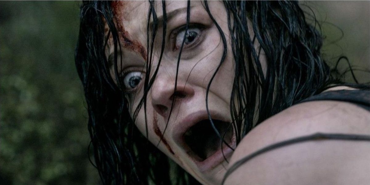 A woman screams in the woods from Evil Dead 2013
