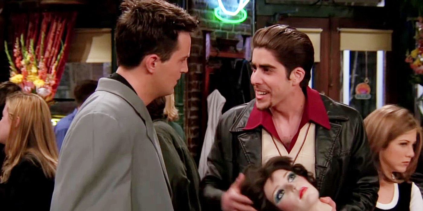 Eddie holding a mannequin's head and talking to Chandler in Friends