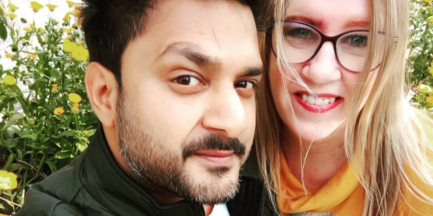 Sumit Singh and Jenny Slatten from 90 day fiance smiling in close up outside