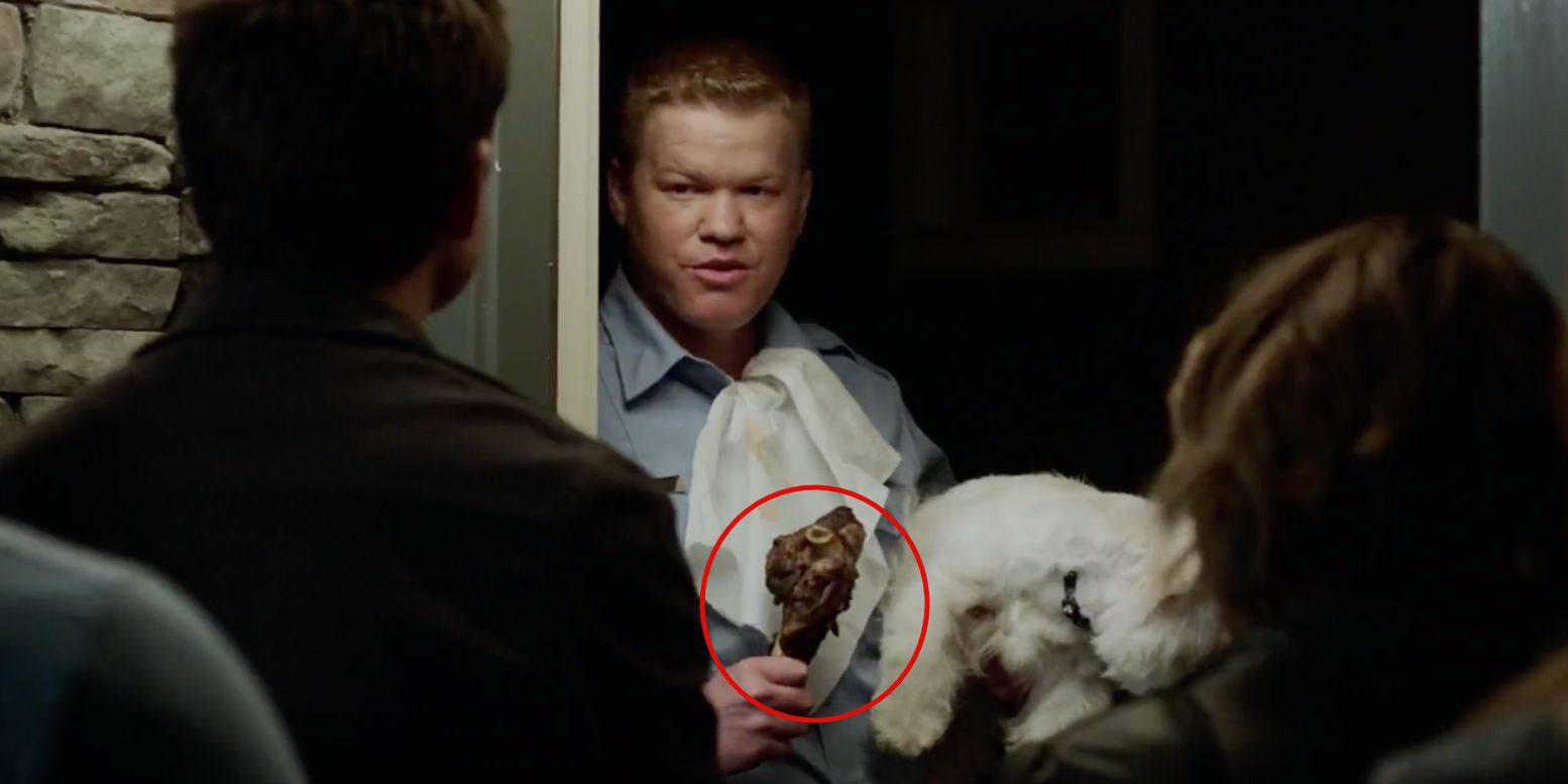 Game Night: Jesse Plemmons as Gary, holding a lamb shank.
