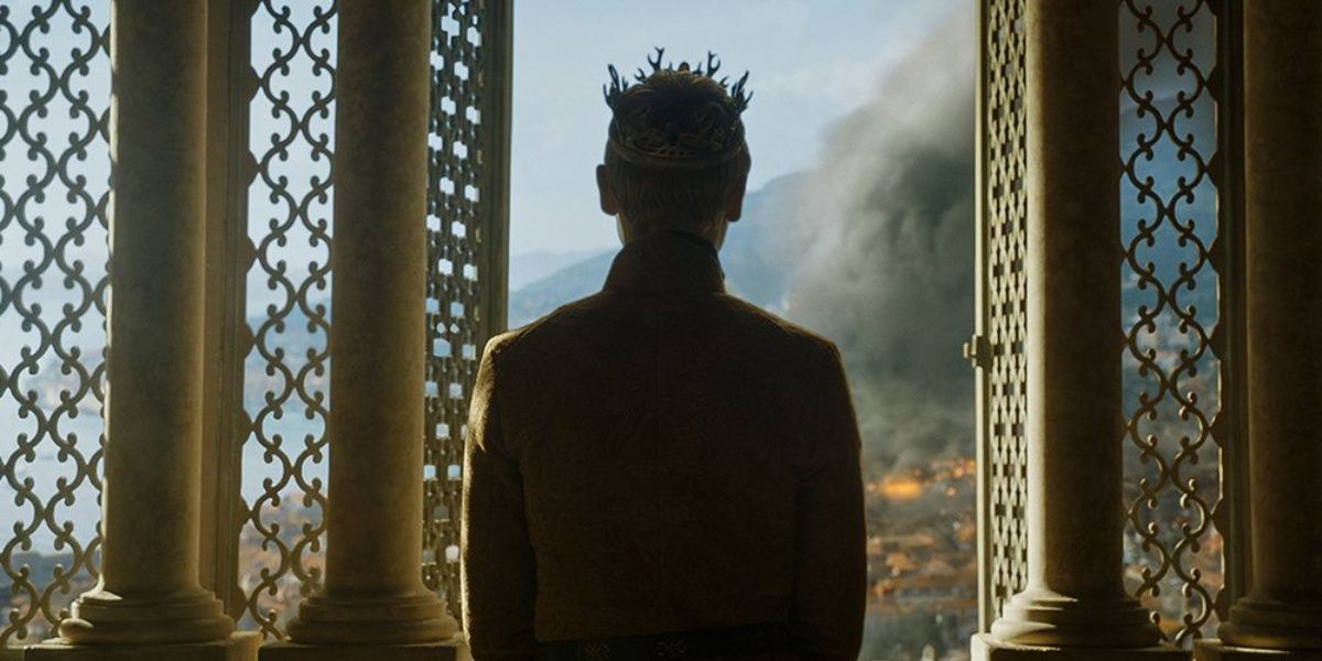 A shot from behind of Tommen walking into an open window in Game of Thrones