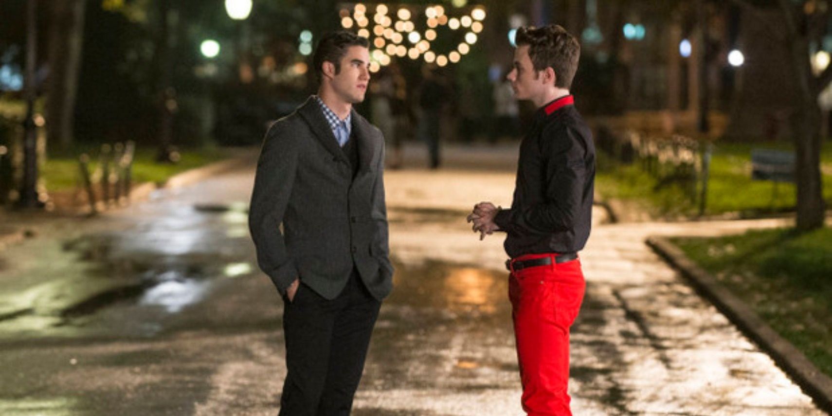 Glee's Kurt and Blaine stand on a street at night