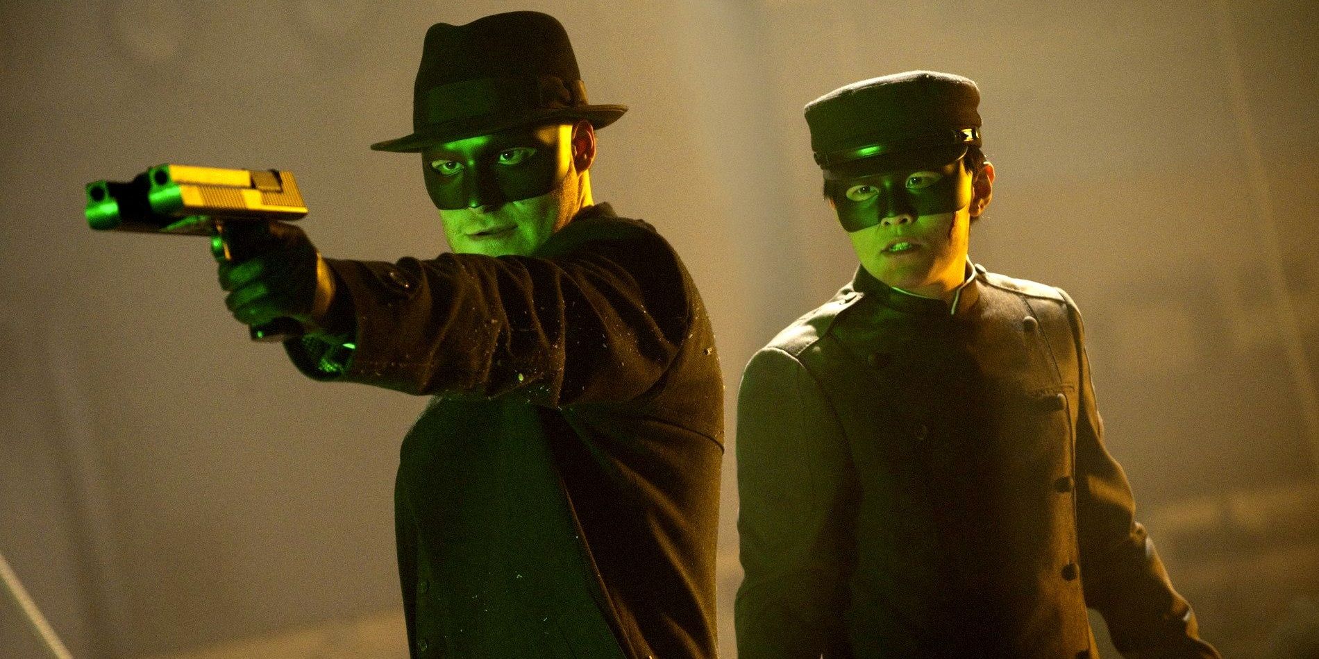 Britt holds a gun with Kato standing next to him in The Green Hornet