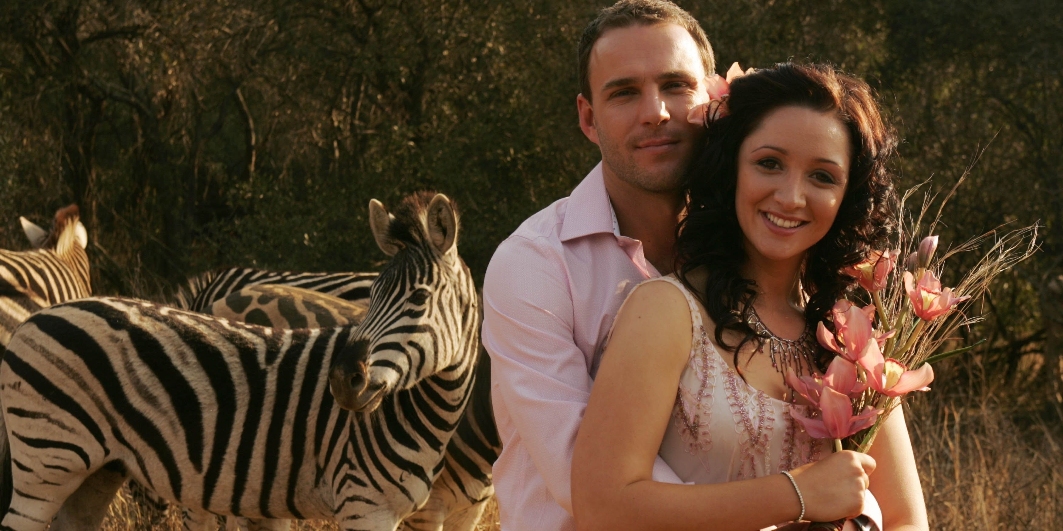 Zebras and a couple holding flowers in the Wild at Heart remake, Life Is Wild