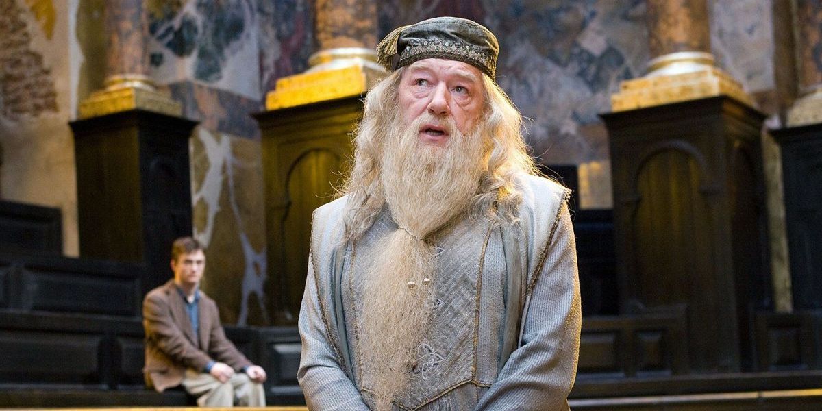Dumbledore talking with Harry in the background in Harry Potter.