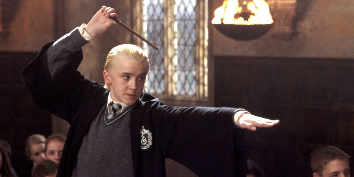 Draco Malfoy pointing his wand in a duel in Harry Potter