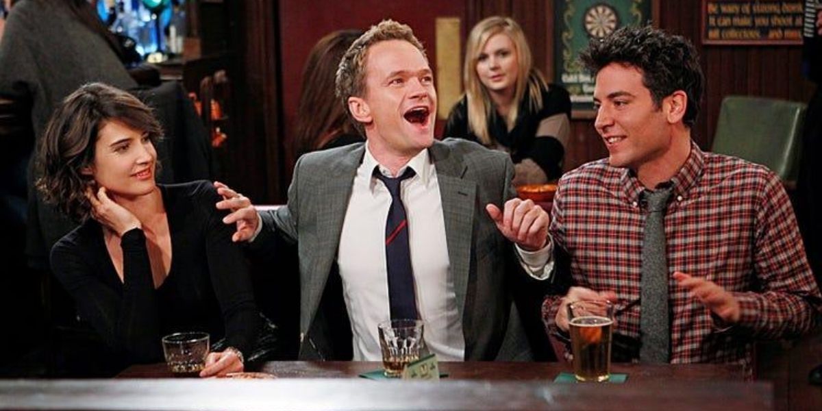Robin, Barney, and Ted having fun at the bar in How I Met Your Mother