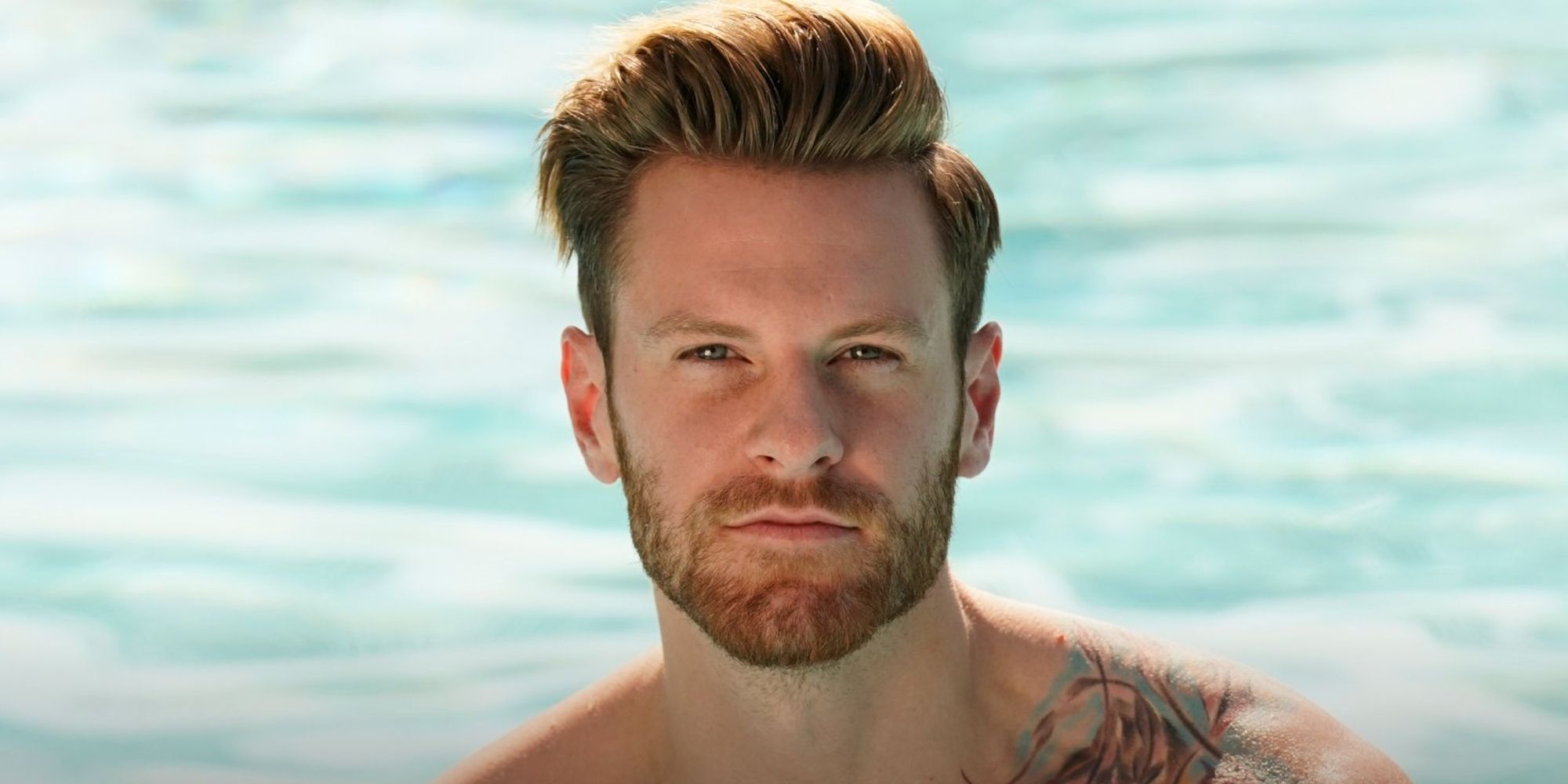 A close-up of James McCool at the sea in Love Island USA