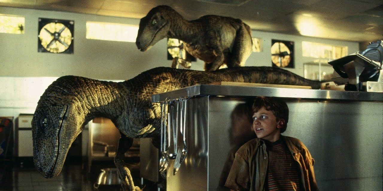 The raptors stalk Tim in the kitchen in Jurassic Park