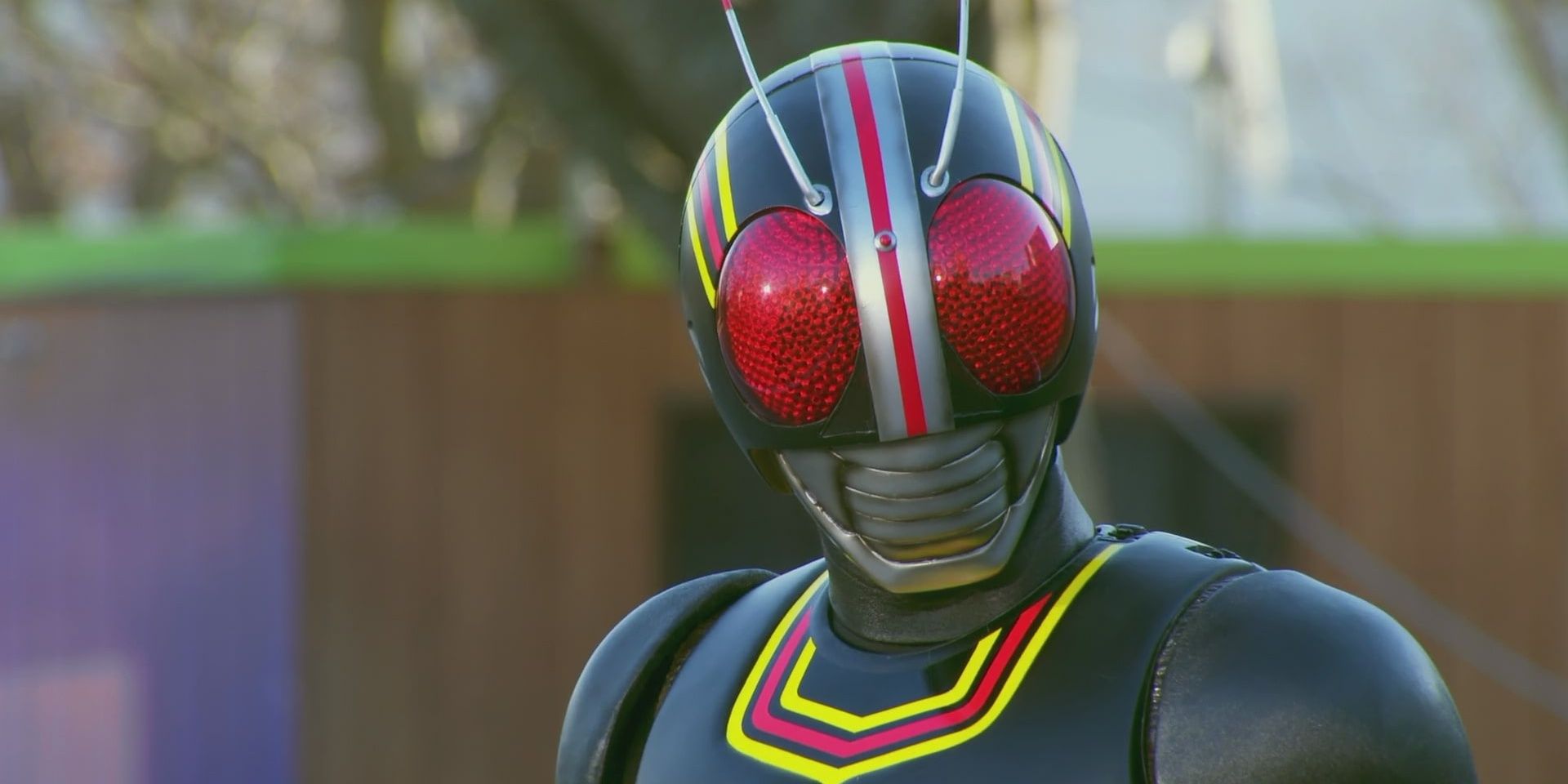A closeup of Kamen Rider Black and his insect-like helmet