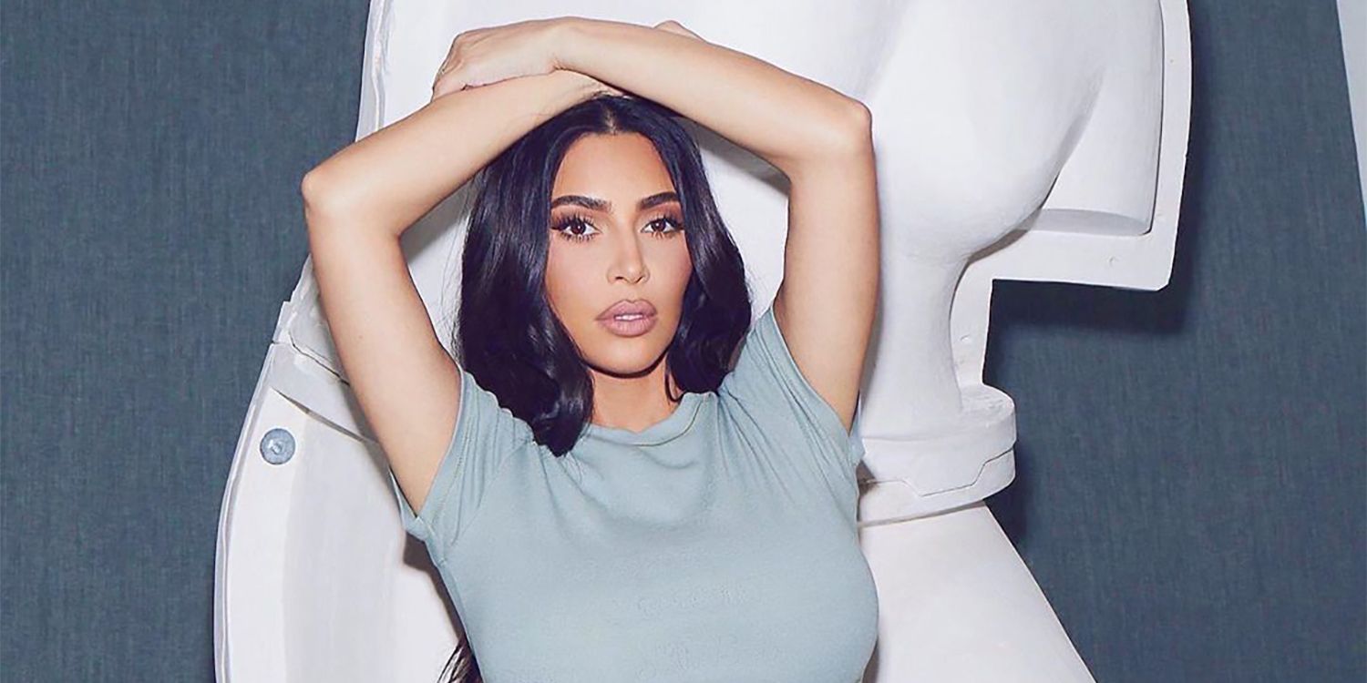 Kim Kardashian Strikes A Pose For Brown SKIMS In Mirror Selfie