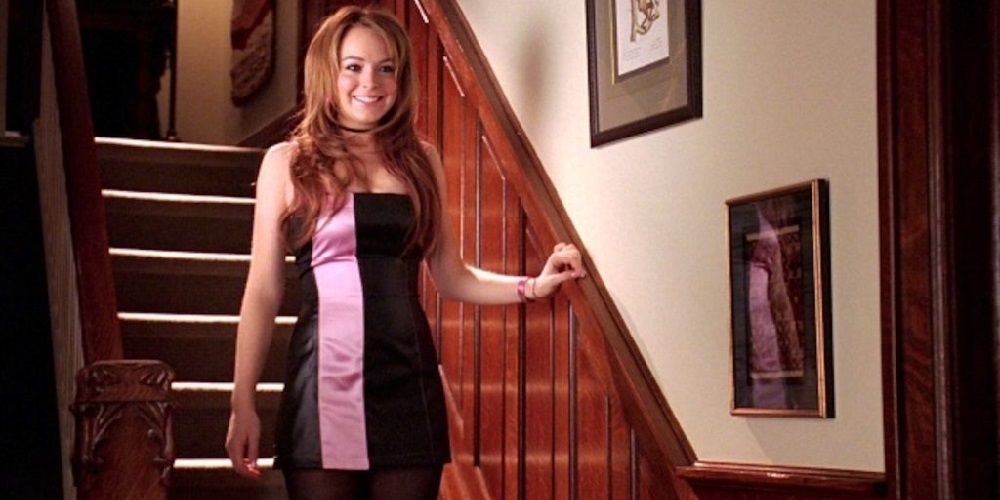 Cady comes down the stairs in her pink and black dress in Mean Girls