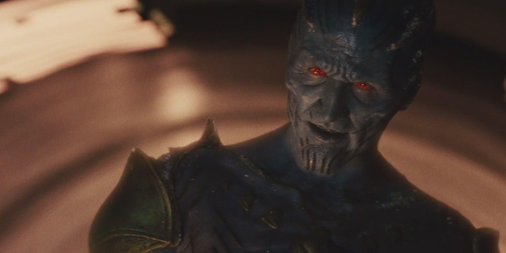 Laufey smiling and tilting his head in Thor.