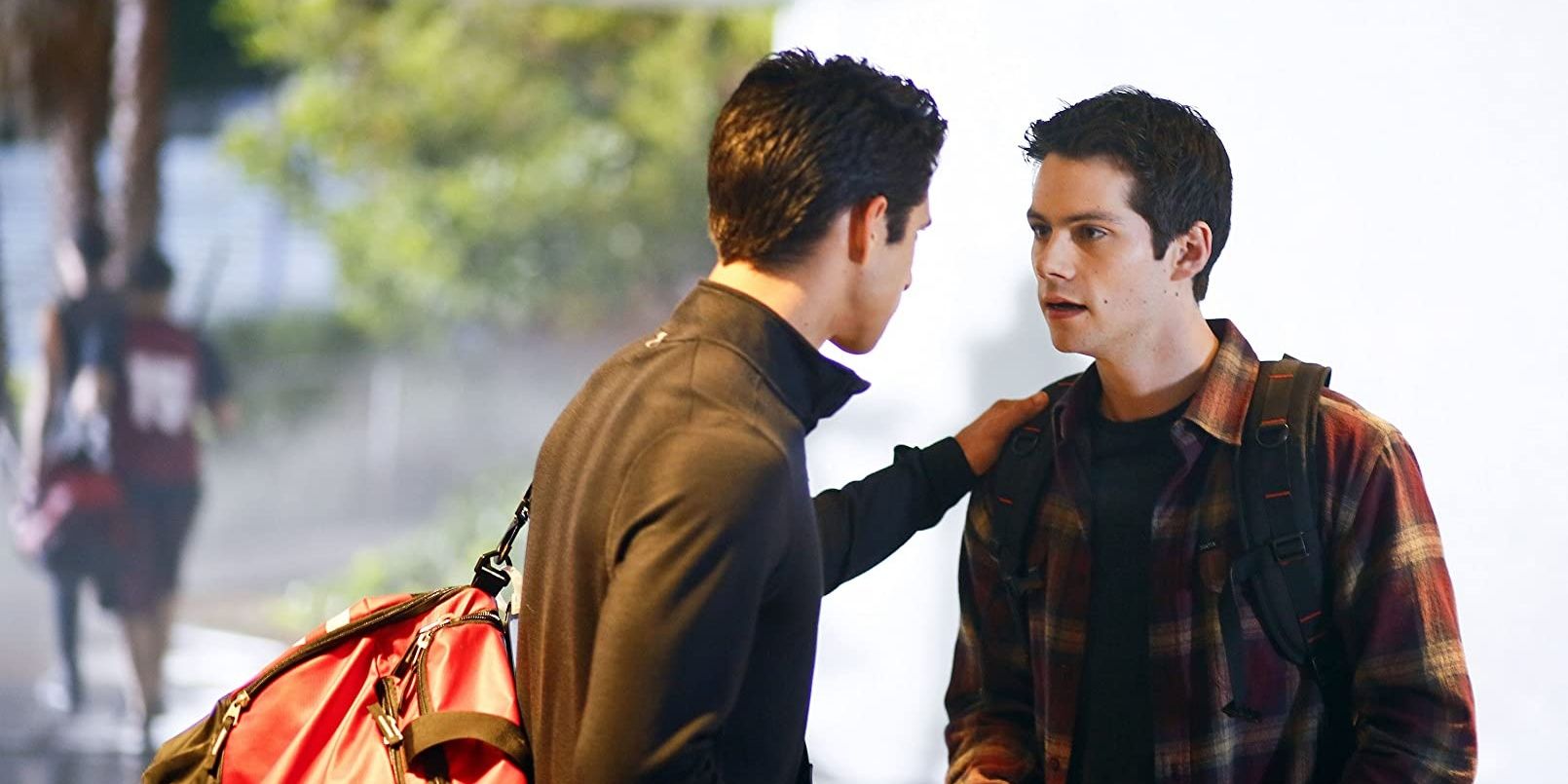 Scott puts his hand on Stiles's shoulder in Teen Wolf.