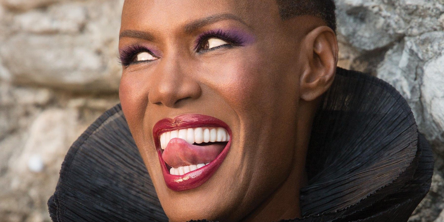 May Day (Grace Jones) licking lips in A View to a Kill James Bond