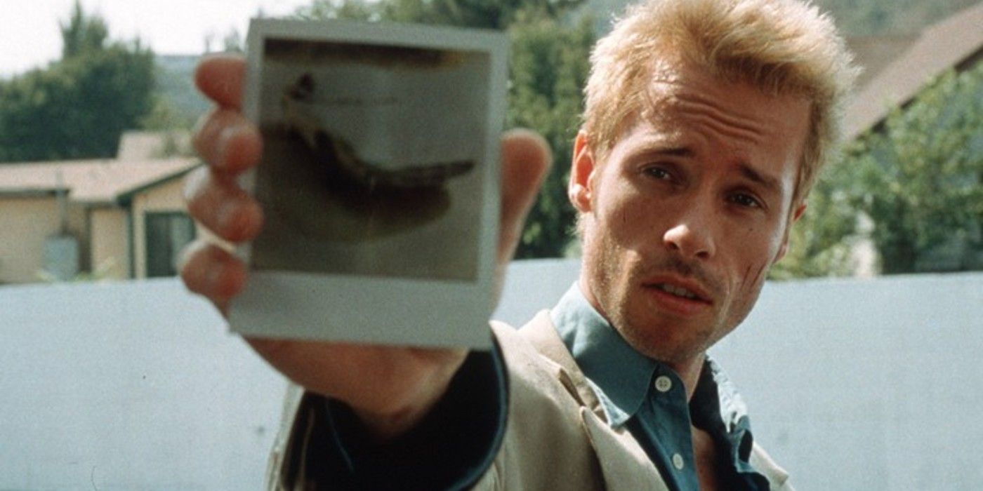 Leonard holding up a polaroid in Memento.