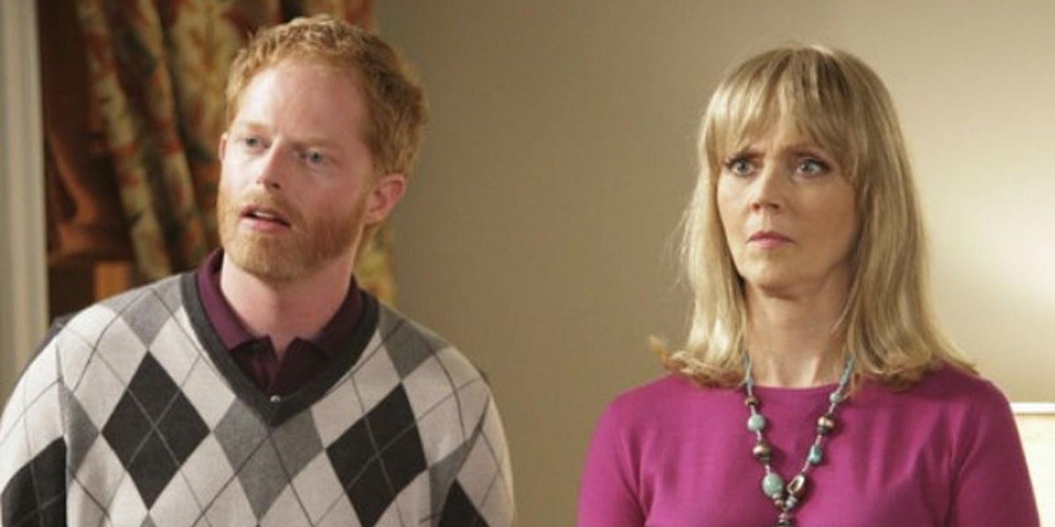 Mitch with DeDe looking surprised in Modern Family