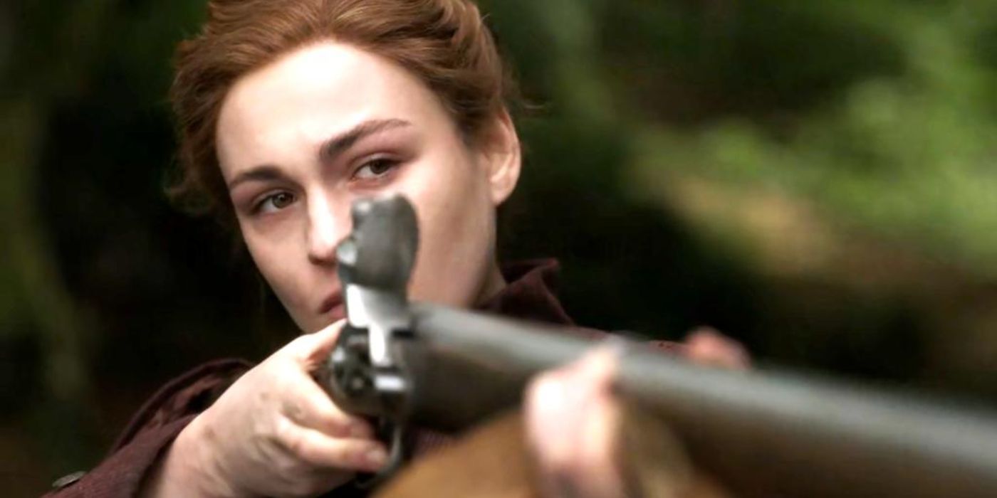 Brianna aims a rifle on Outlander