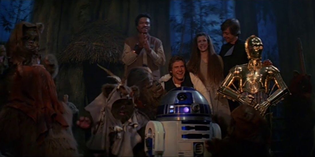 The heroes celebrate on Endor in Star Wars: Return of the Jedi