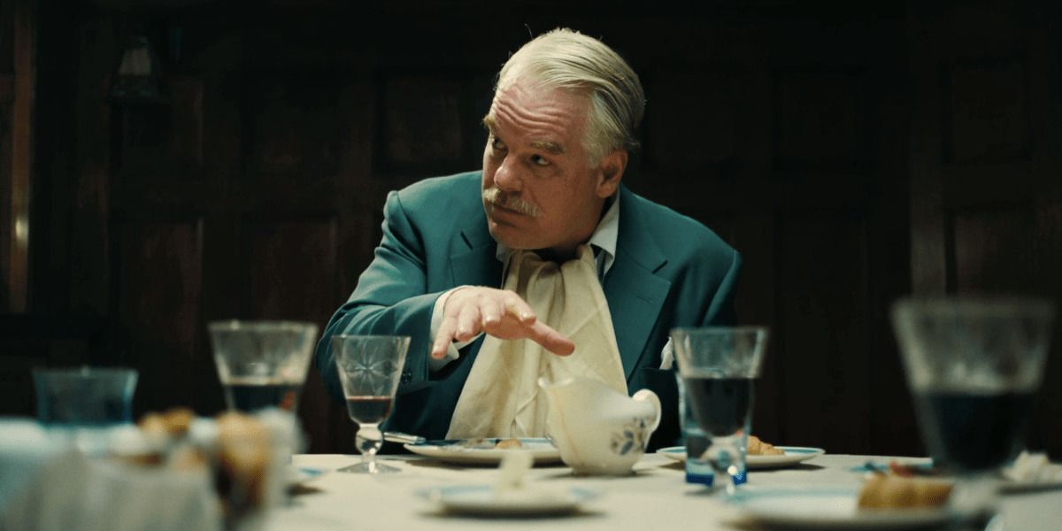 Phillip Seymour Hoffman as Lancaster Dodd eating in the Master